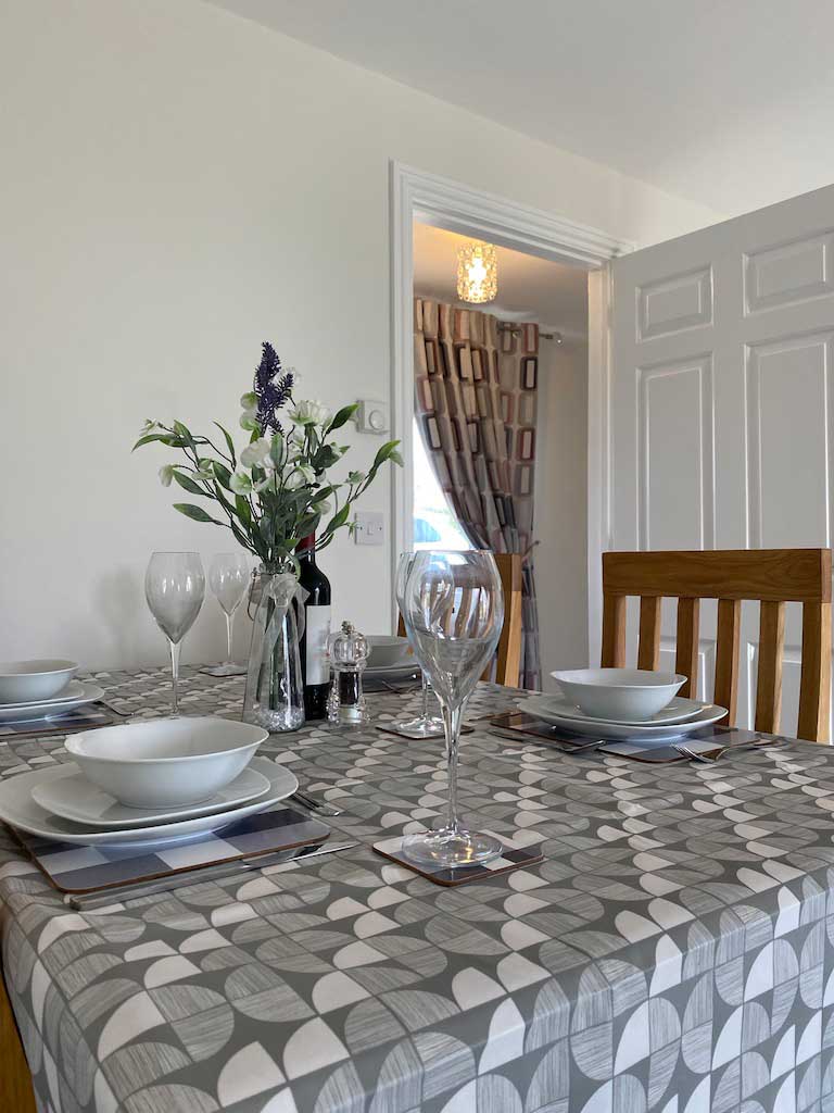 Interior view of dining table in suffolk holiday accommodation