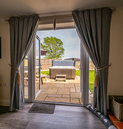 Holiday barns in Suffolk with garden hot tub